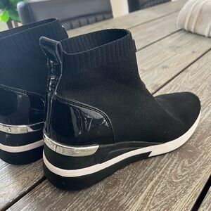 Michael Kors black stretch pull on boots, size 9.